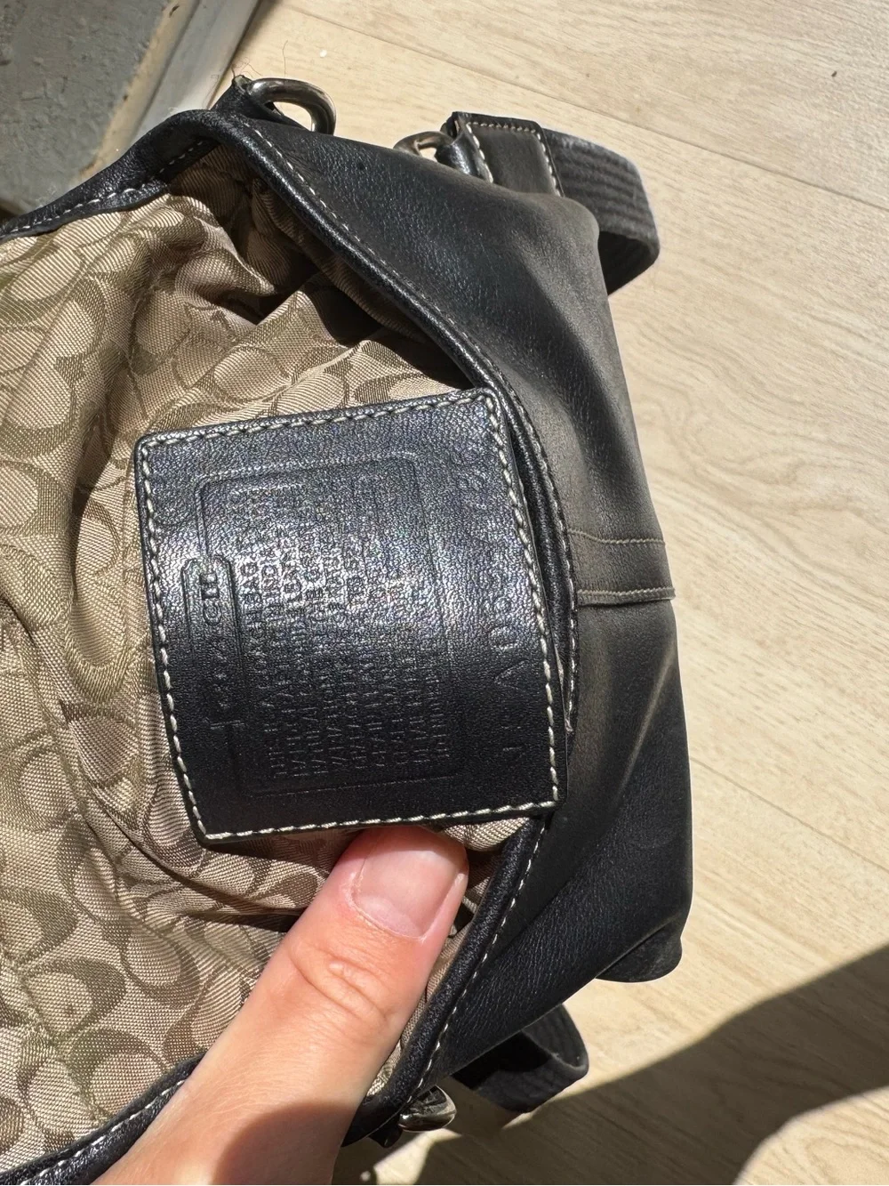 Black Coach Leather Crossbody Bag with Buckle Detail